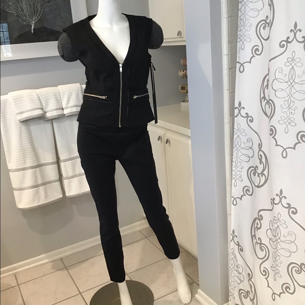 Bebe sleeveless pant suit with zipper detail NWT